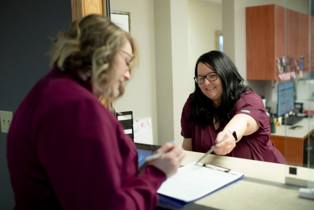 Columbia Oral Surgery Partners Staff Helping Patients